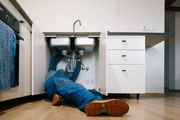 Professional Drain Cleaning technician working in Warda, TX
